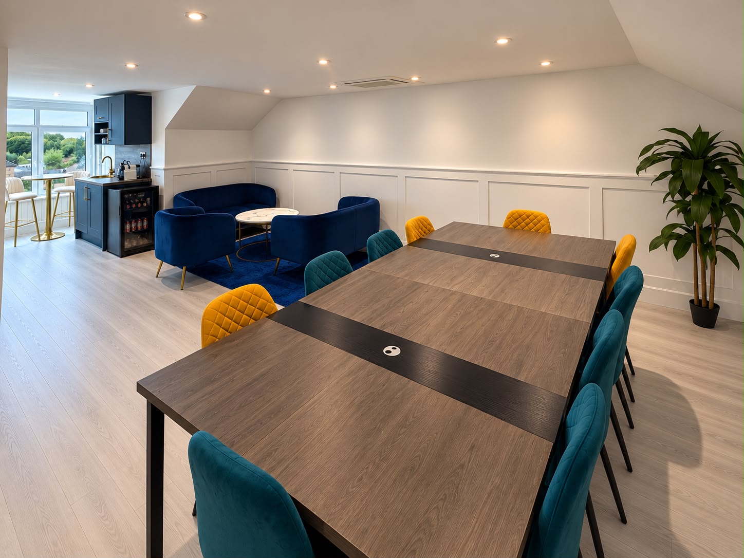 The Boardroom meeting table and lounge area